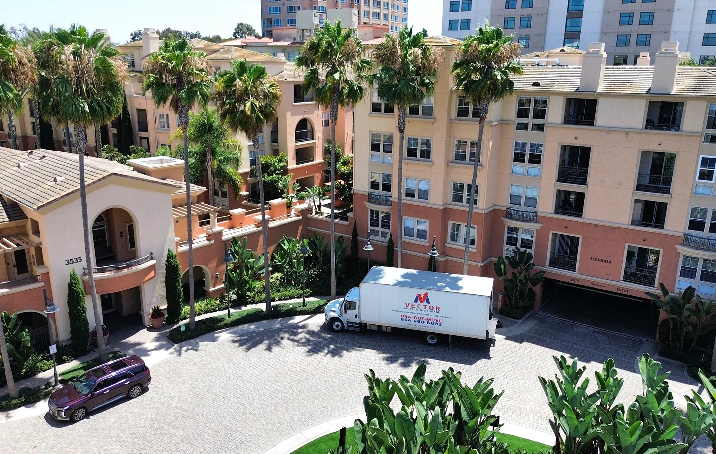 Vector moving truck at a condominium community