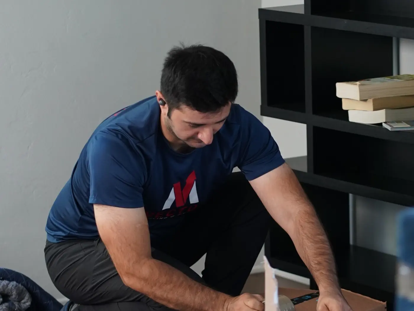 Vector mover packing household items included in a moving estimate