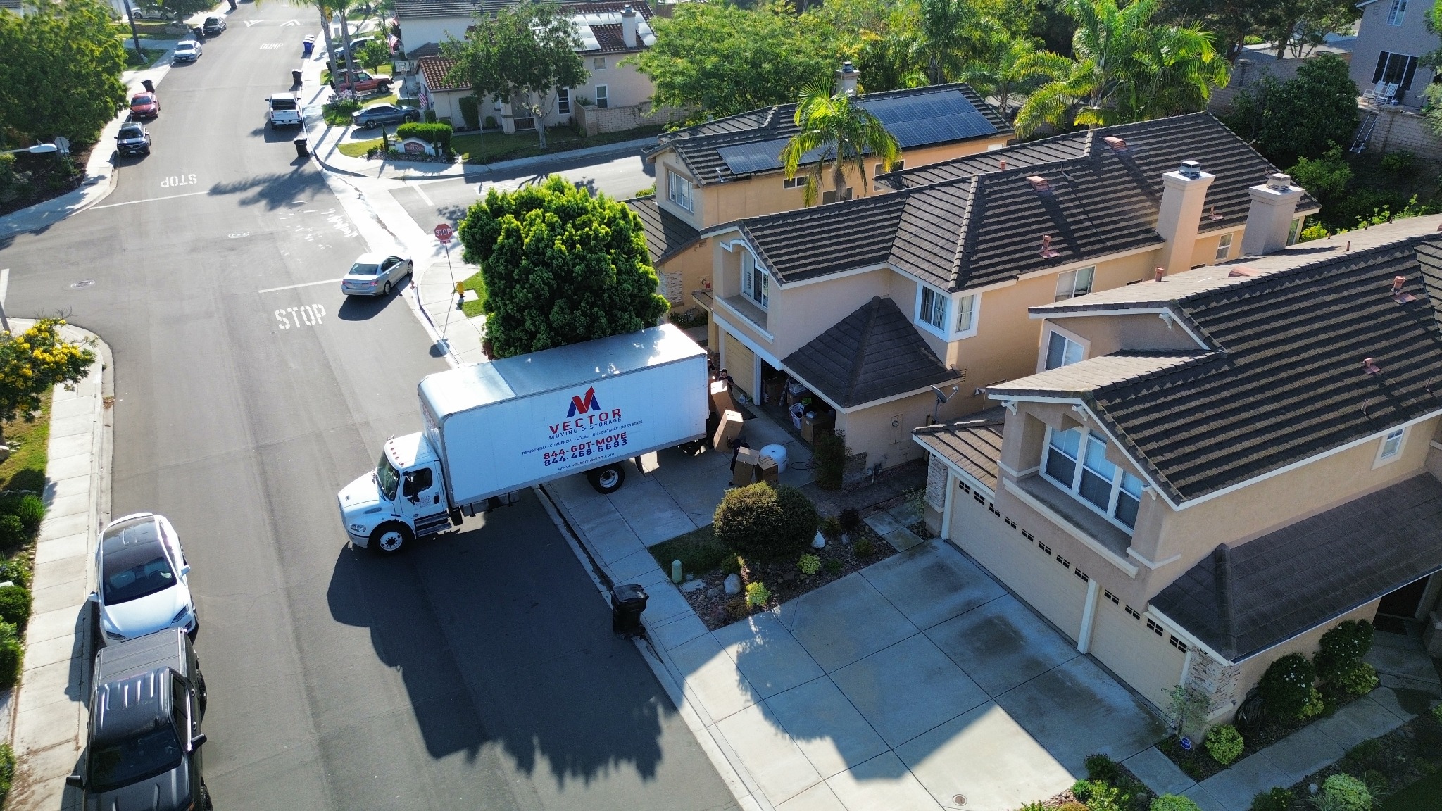 Vector Moving and Storage truck outside a San Diego home before a residential move
