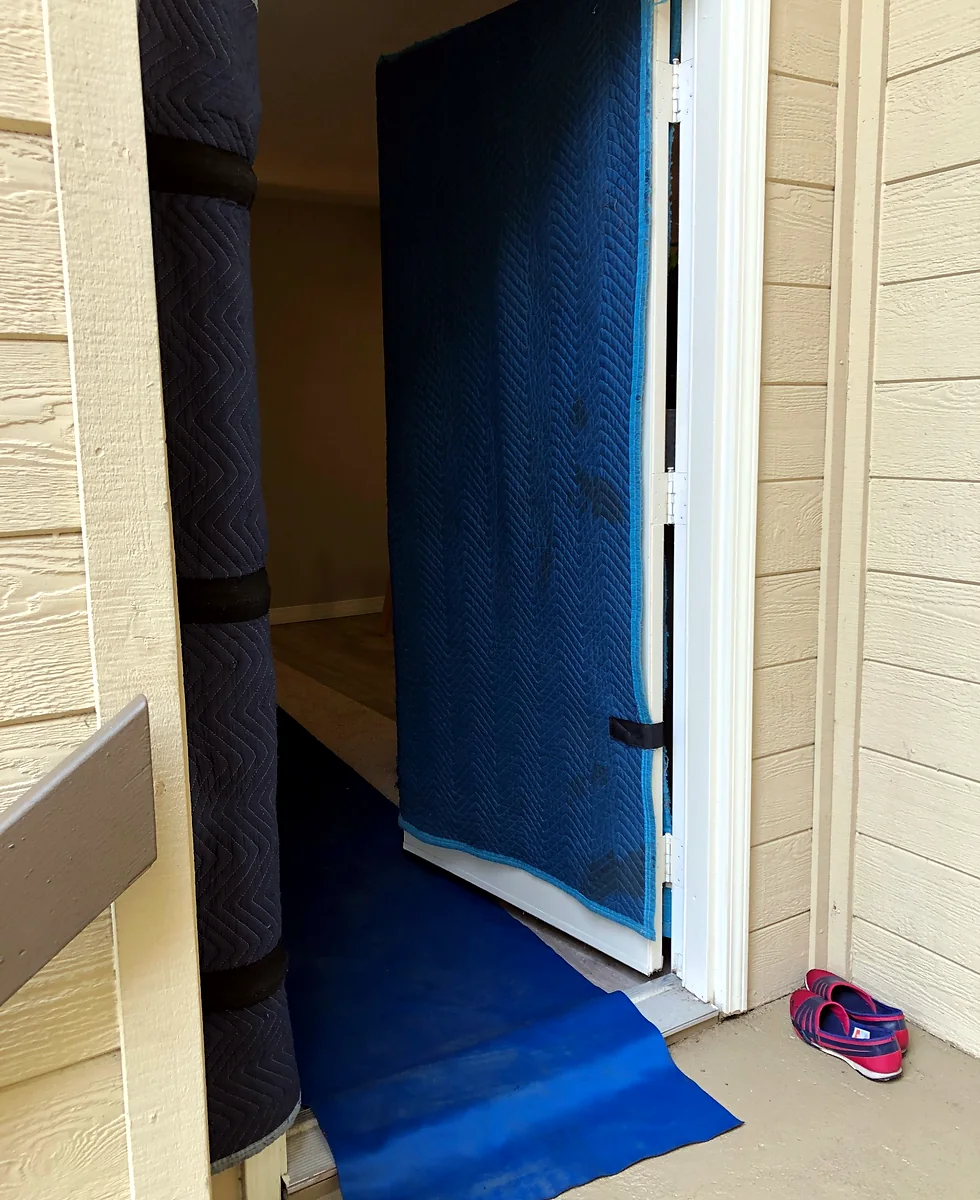 Padded doorway and floor protection prepared for a residential move