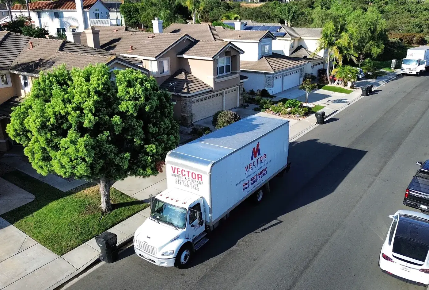 Vector Moving and Storage truck in a residential neighborhood