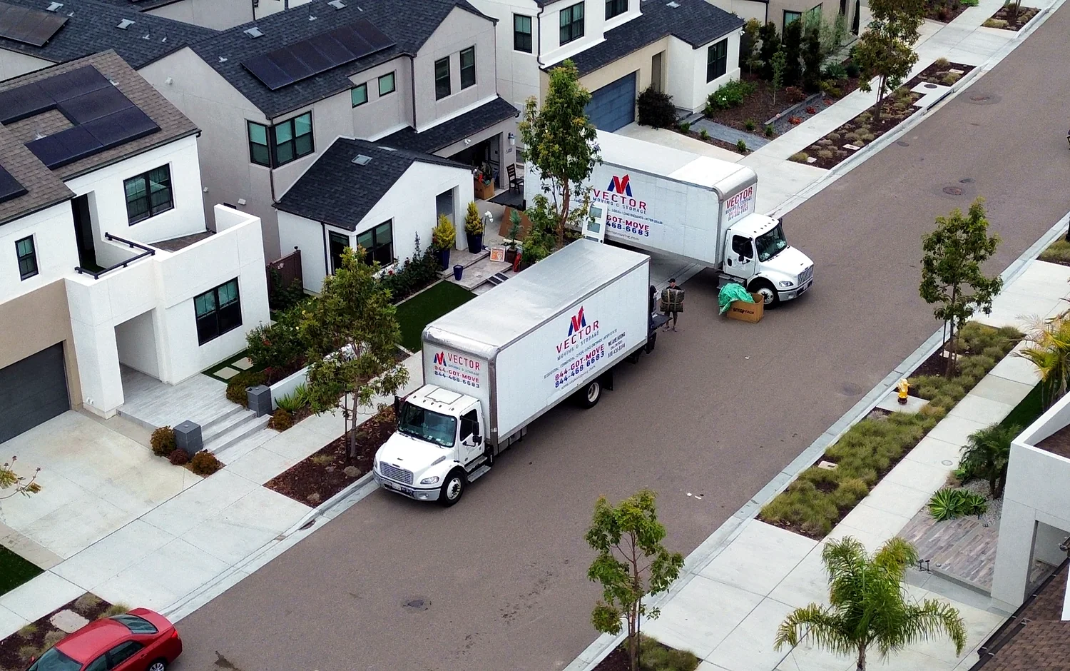 Vector moving truck at a San Diego residential property