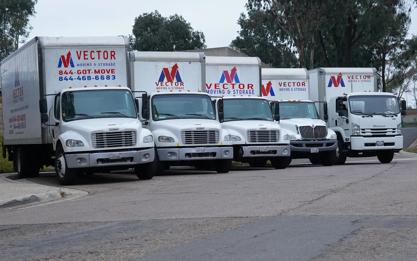 Vector Moving and Storage trucks ready for scheduled moving services