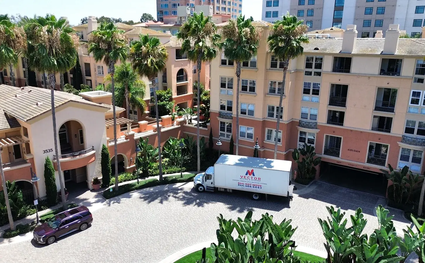 Vector moving truck outside a residential building