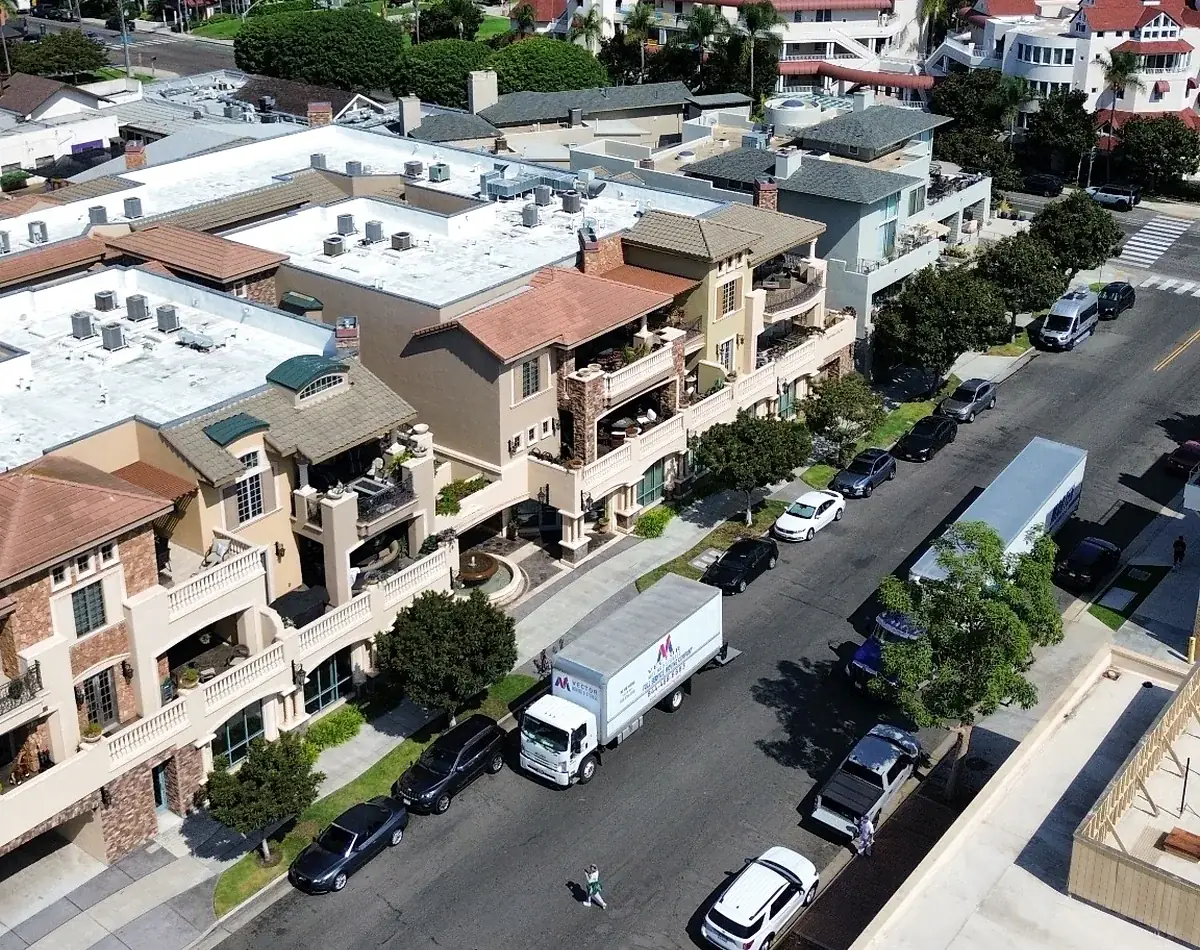 Vector moving truck on a dense Southern California residential street