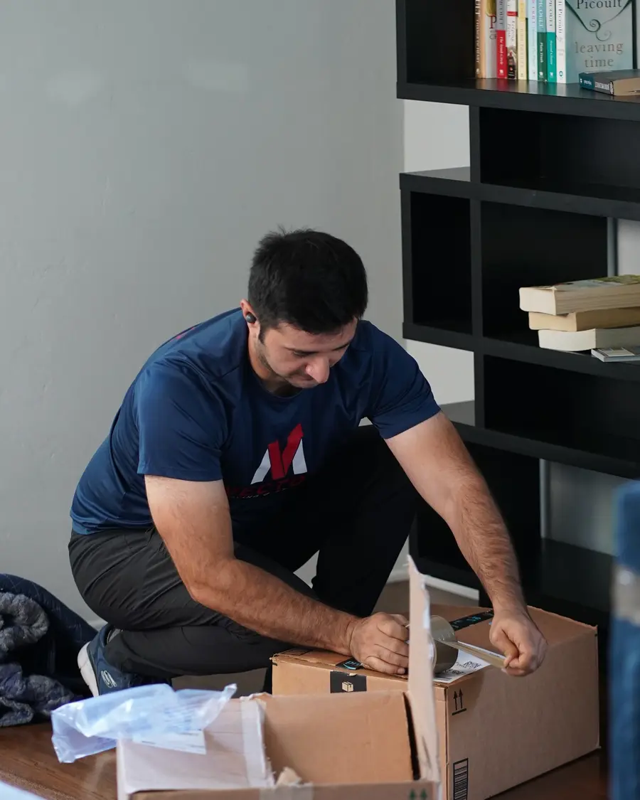 Vector mover sealing a household packing carton
