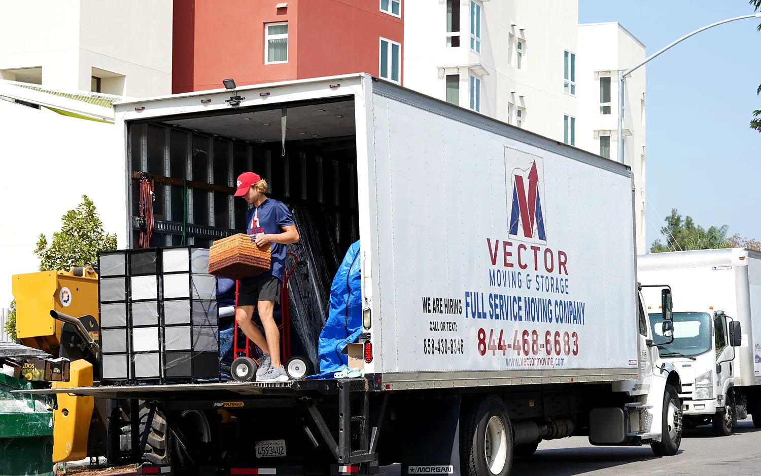 Vector mover unloading equipment and packed business contents from a moving truck