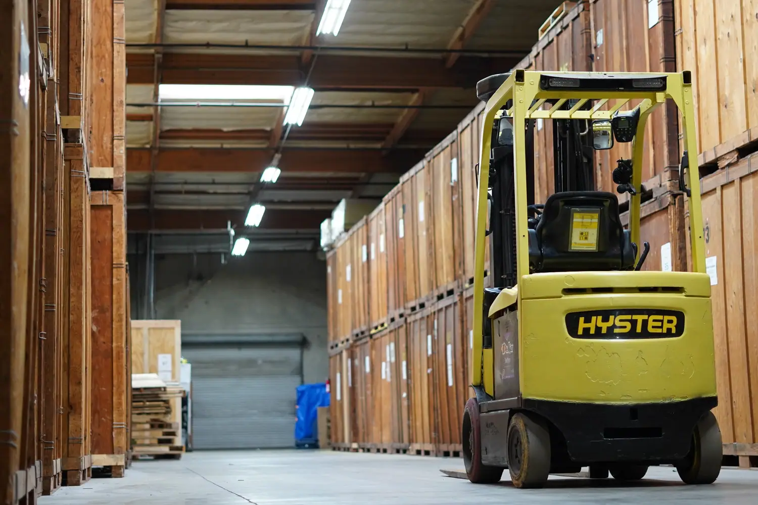 Vector warehouse with wooden storage vaults and professional material-handling equipment